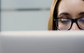 Stock Footage Woman With Glasses Working On A Computer Free