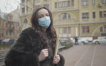 Stock Footage Woman Wearing A Face Mask On The Street Free
