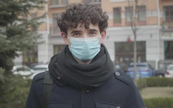 Stock Footage Young Man With Face Mask On The Street Free