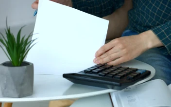 Stock Footage Woman Doing Accounts On A Calculator Free