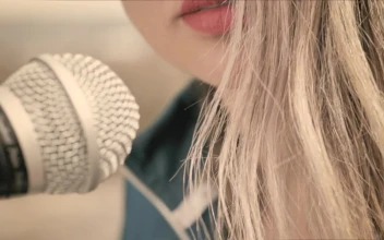 Stock Footage Woman Singing Into A Microphone Closeup Free