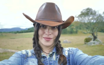 Stock Footage Woman Making Faces At The Camera With A Countryside Background Free
