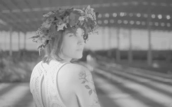 Stock Footage Woman Wearing A Wreath Walking Towards Another Woman In An Free