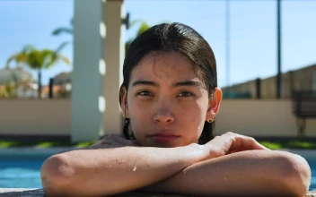 Stock Footage Woman Lounging On The Edge Of The Pool Free