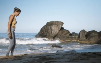 Stock Footage Woman Doing Yoga On The Beach Free