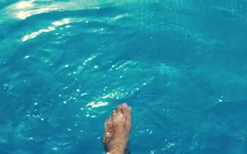 Stock Footage Womans Feet Splashing In The Pool Free
