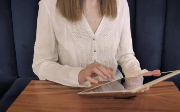 Stock Footage Woman Using A Tablet On The Couch Free
