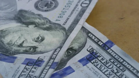 Stock Video 100 bills falling to the table PC Live Wallpaper - Free Live Wallpaper