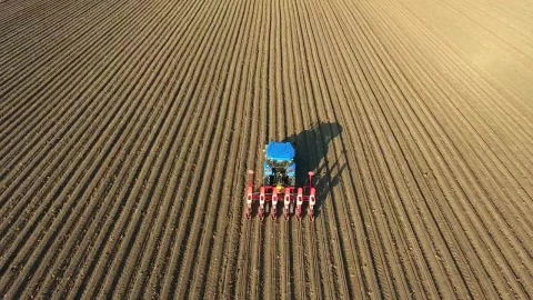 Stock Video A Blue Tractor Working On An Agricultural Field Live Wallpaper for PC - Free Live Wallpaper