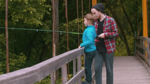 Stock Video A Boy And A Man Fishing On A Bridge In Live Wallpaper for PC - Free Live Wallpaper