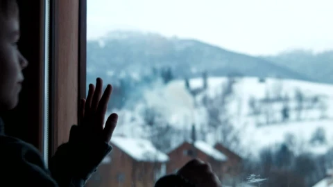 Stock Video A Boy Draws Imaginary Shapes On Window Live Wallpaper for PC - Free Live Wallpaper