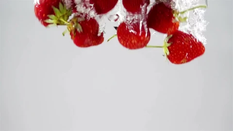 Stock Video A Bunch Of Strawberries Falling Through Water Live Wallpaper for PC - Free Live Wallpaper