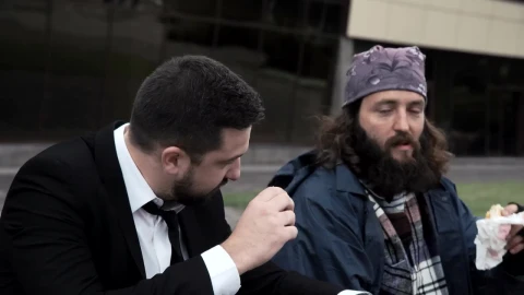 Stock Video A Business Man And Homeless Eating Together Live Wallpaper for PC - Free Live Wallpaper
