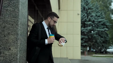 Stock Video A Business Man Is Eating While Walking Live Wallpaper for PC - Free Live Wallpaper