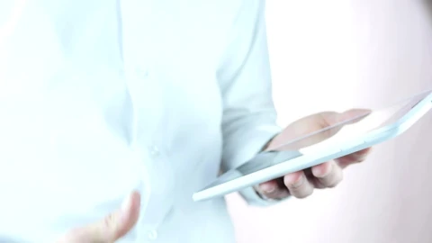 Stock Video A Businessman Holding A Tablet Does The Thumbs Up Sign Live Wallpaper for PC - Free Live Wallpaper