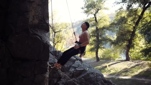 Stock Video A Climber Testing The Ropes On The Rock Live Wallpaper for PC - Free Live Wallpaper