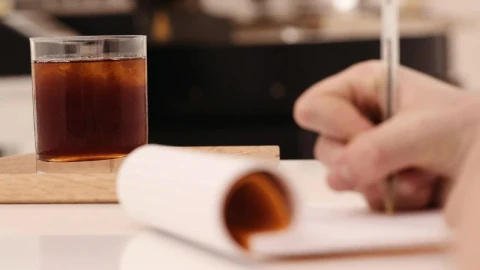 Stock Video A Coffee Drinker Taking Notes Live Wallpaper for PC - Free Live Wallpaper