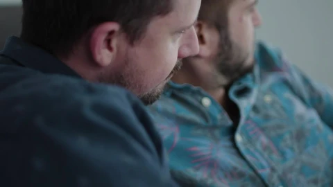 Stock Video A Couple Is Sitting Together On A Couch Live Wallpaper for PC - Free Live Wallpaper