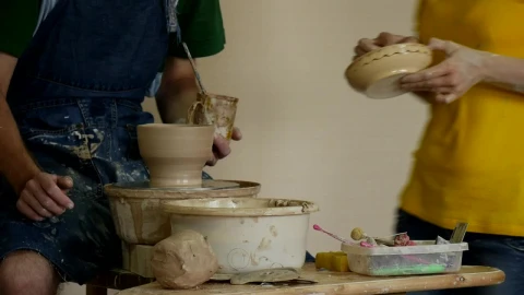 Stock Video A Couple Of Ceramic Artists Conversating Live Wallpaper for PC - Free Live Wallpaper