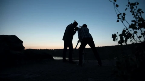 Stock Video A Couple Of Friends Stargazing Using The Telescope Live Wallpaper for PC - Free Live Wallpaper