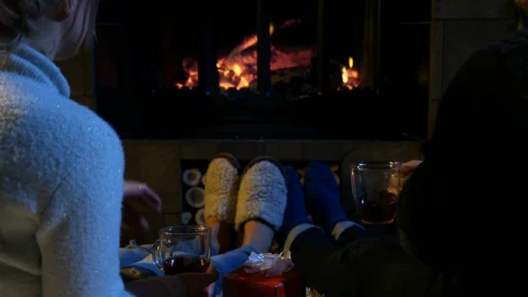 Stock Video A Couple Relaxing In Front Of A Chimney Live Wallpaper for PC - Free Live Wallpaper