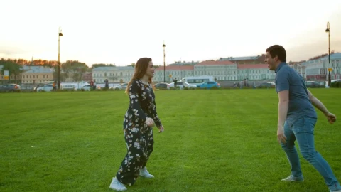 Stock Video A Cute Couple Playing On The Grass Live Wallpaper for PC - Free Live Wallpaper