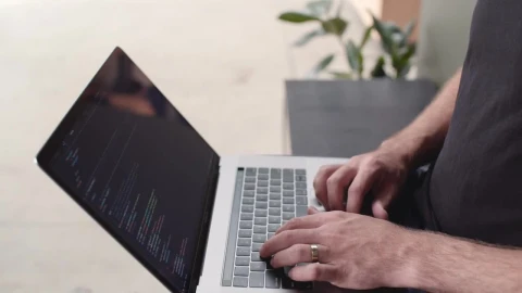 Stock Video A Developer Typing On A Laptop Top View Live Wallpaper for PC - Free Live Wallpaper