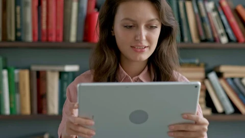 Stock Video Academic Studying With A Tablet At The University Library Live Wallpaper for PC - Free Live Wallpaper