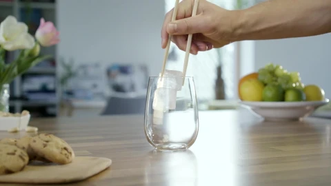 Stock Video Adding Ice To A Glass With Chopsticks Live Wallpaper for PC - Free Live Wallpaper
