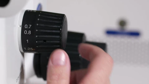 Stock Video Adjusting The Zoom On A Microscope Live Wallpaper for PC - Free Live Wallpaper