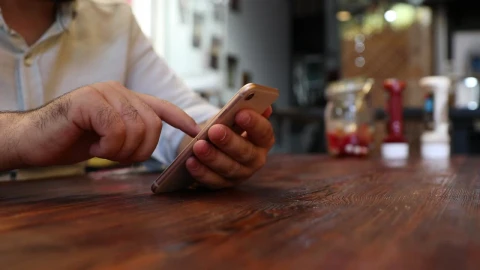 Stock Video Adult Man In A Restaurant Viewing His Cell Live Wallpaper for PC - Free Live Wallpaper