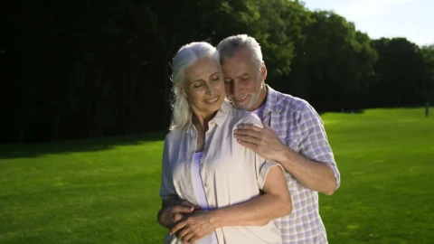 Stock Video Adult Man And Woman Embracing On A Meadow Live Wallpaper for PC - Free Live Wallpaper