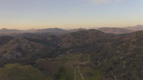 Stock Video Aerial Shot Of A Tree Covered Mountain Range Live Wallpaper for PC - Free Live Wallpaper