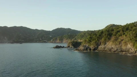 Stock Video Aerial Tour Around A Coastline On A Sunny Day Live Wallpaper for PC - Free Live Wallpaper
