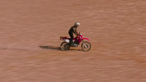 Stock Video Aerial Tracking Of A Man On A Motorcycle In The Live Wallpaper for PC - Free Live Wallpaper