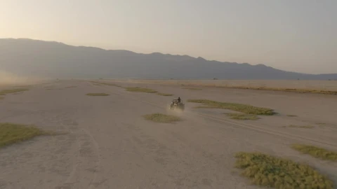 Stock Video Aerial View Of A Jeep Traveling Through A Desert At Live Wallpaper for PC - Free Live Wallpaper
