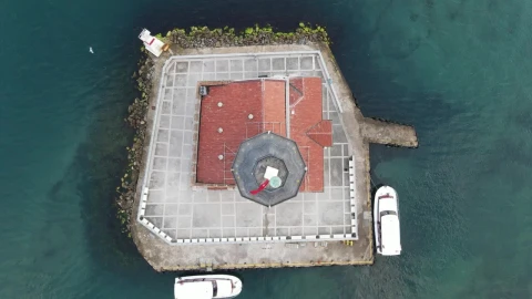 Stock Video Aerial View Of A Lighthouse On A Small Island Live Wallpaper for PC - Free Live Wallpaper