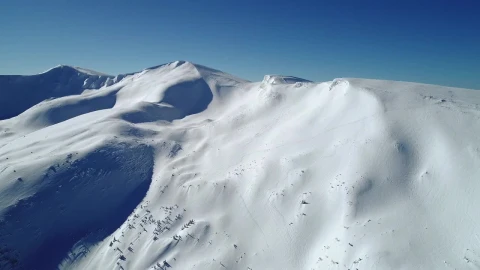 Stock Video Aerial View Of A Snow Covered Mountain Landscape Live Wallpaper for PC - Free Live Wallpaper