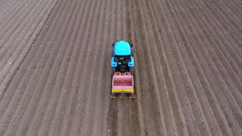 Stock Video Aerial View Of A Tractor Preparing The Soil Live Wallpaper for PC - Free Live Wallpaper