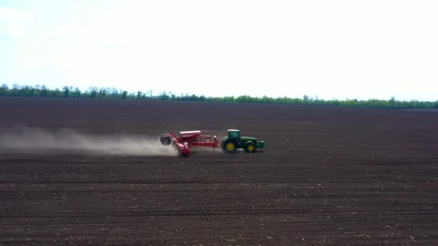 Stock Video Aerial View Of A Tractor Working On The Dirt Field Live Wallpaper for PC - Free Live Wallpaper