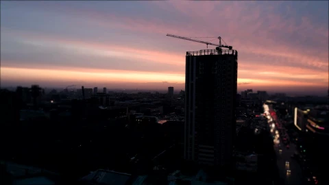 Stock Video Aerial View Of City Construction Crane At Sunset Live Wallpaper for PC - Free Live Wallpaper