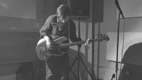 Stock Video Bassist Tuning His Instrument Live Wallpaper For PC - Free Live Wallpaper