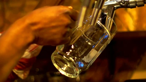 Stock Video Bartender Serving Beer On A Beer Mug Live Wallpaper For PC - Free Live Wallpaper