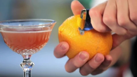 Stock Video Barman Preparing An Orange Cocktail Live Wallpaper For PC - Free Live Wallpaper