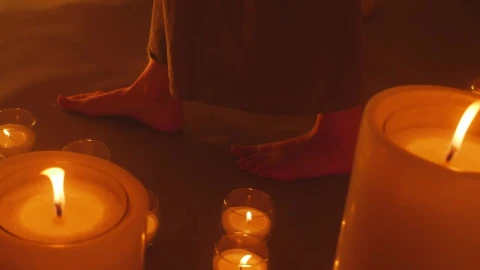 Stock Video Bare Feet Of A Woman Walking Among Burning Candles Live Wallpaper For PC - Free Live Wallpaper