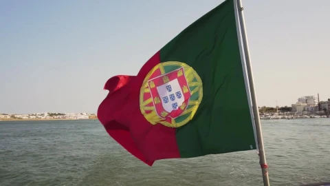 Stock Video Bandera De Portugal Ondeando En El Mar Con La Costa Live Wallpaper For PC - Free Live Wallpaper