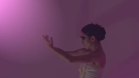 Stock Video Ballet Dancer Moving Her Hands Under A Dim Pink Light Live Wallpaper For PC - Free Live Wallpaper