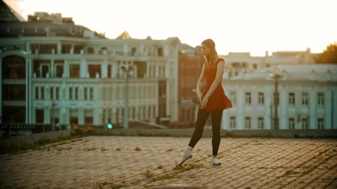 Stock Video Ballet Dancer Dancing On The Roof Of A Building In Live Wallpaper For PC - Free Live Wallpaper