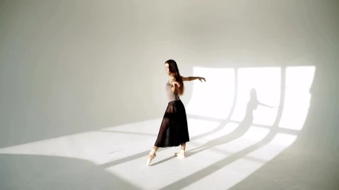 Stock Video Ballerina Spins In Black Tutu In Sunlit White Room Live Wallpaper For PC - Free Live Wallpaper
