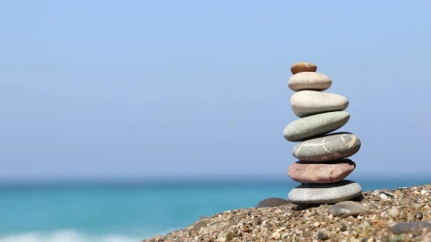 Stock Video Balanced Stones On The Edge Of A Sunny Beach Live Wallpaper For PC - Free Live Wallpaper